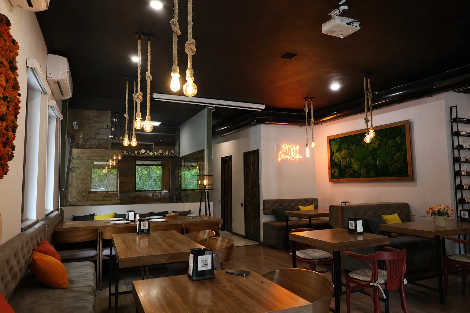 Andrew Kitchen & Bar — main dining hall with warm golden lighting and elegant atmosphere in Yerevan